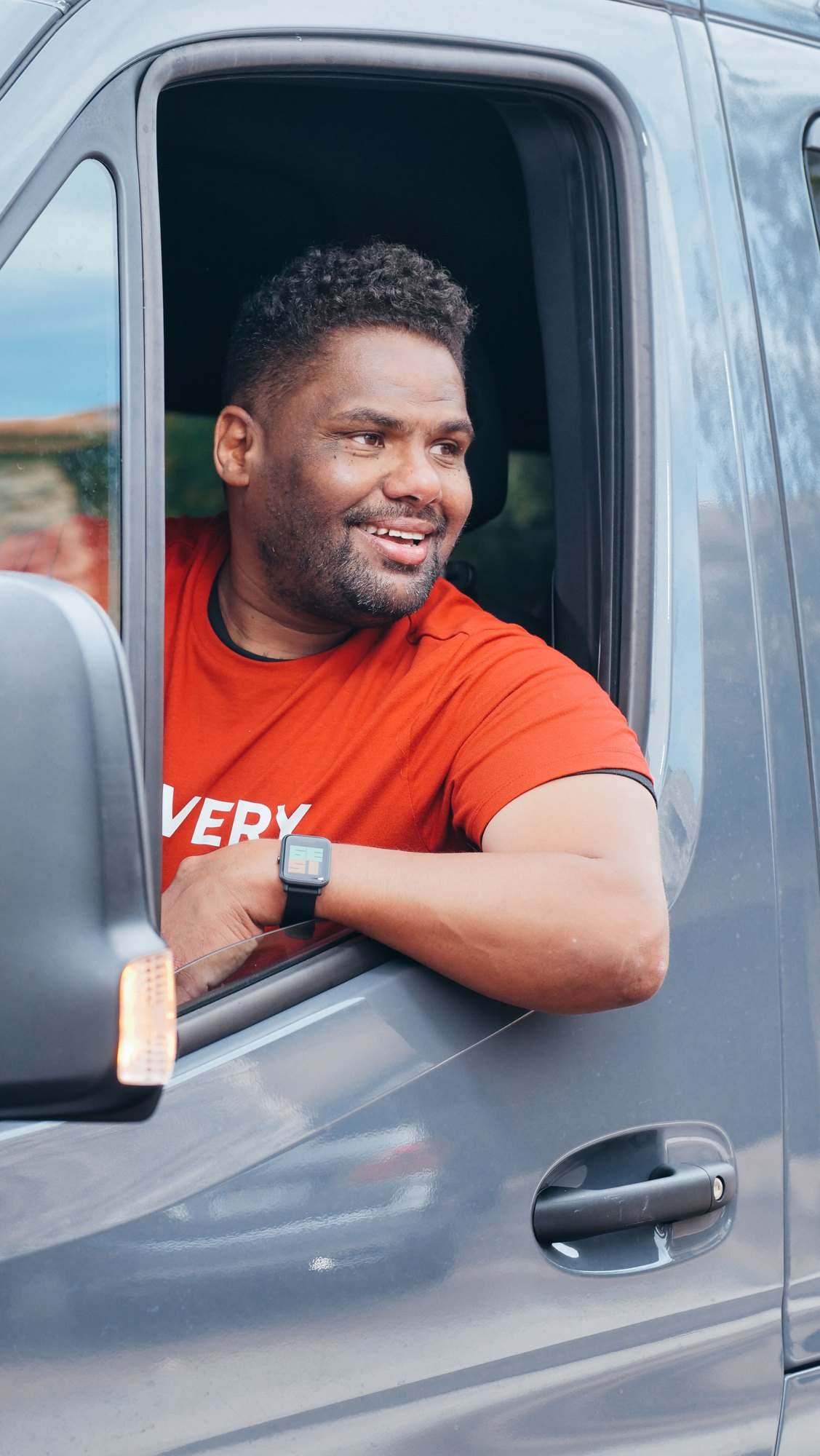 Driver beside his truck
